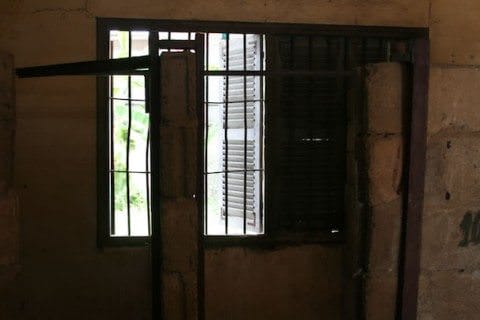 Prison Cells At The Tuol Sleng Genocide Museum