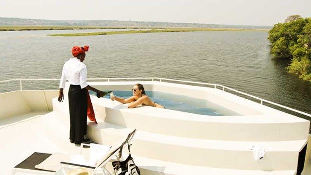 serving a drinkk in the pool on Zambezi Queen river ship