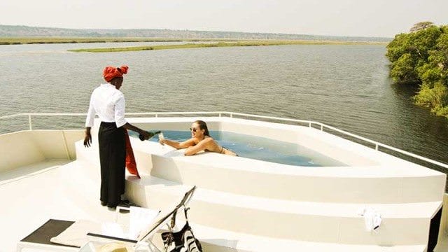 zambezi queen pool serving a drinkk in the pool on Zambezi Queen river ship