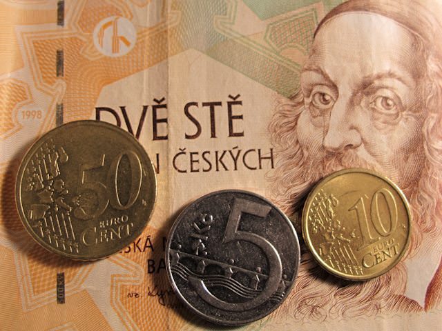 Euro and Czech currency mixed together. Which one should you take with you on your river cruise? Photo © Aaron Saunders