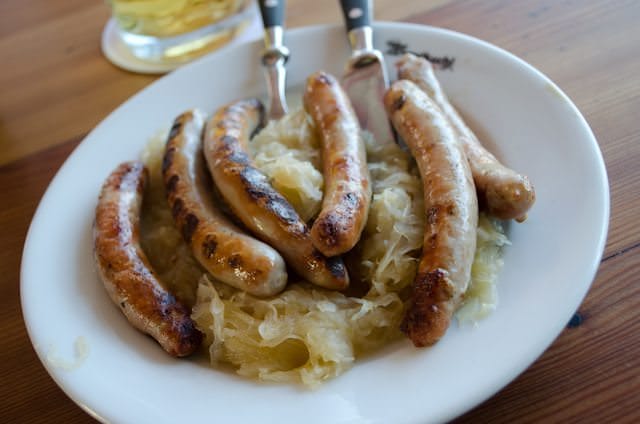 Mmm...Bratwurst mit Sauerkraut at the Wurstkuchl in Regensburg, Germany. Photo © 2012 Aaron Saunders