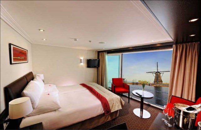 One of the spacious Panorama Suites aboard Avalon's Suite Ships, featuring a wall of glass that opens. Photo courtesy of Avalon Waterways