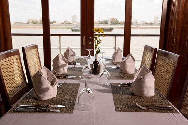 Dining aboard the Angkor Pandaw is, like all Pandaw ships, relaxed and comfortable. Photo courtesy of Pandaw.