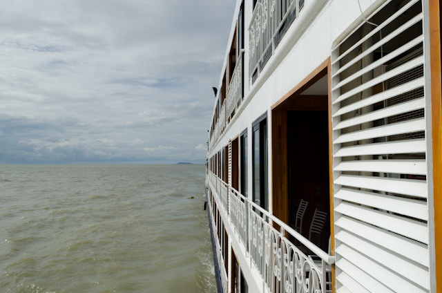 Setting sail across Tonle Sap Lake as our Mekong adventure begins! Photo © 2013 Aaron Saunders