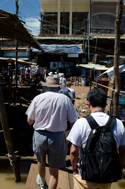 Our walking tour through Kampong Chhnang took us through the town's busy marketplace. Photo © 2013 Aaron Saunders