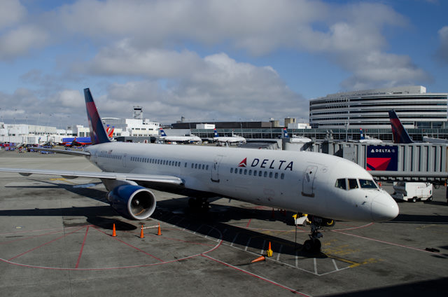 First leg of the trip: Vancouver to Seattle's Tacoma International Airport, pictured above. Delta was having a particularly bad day with Super Typhoon Usagi axing flights to Hong Kong and one to Tokyo. Photo © 2013 Aaron Saunders