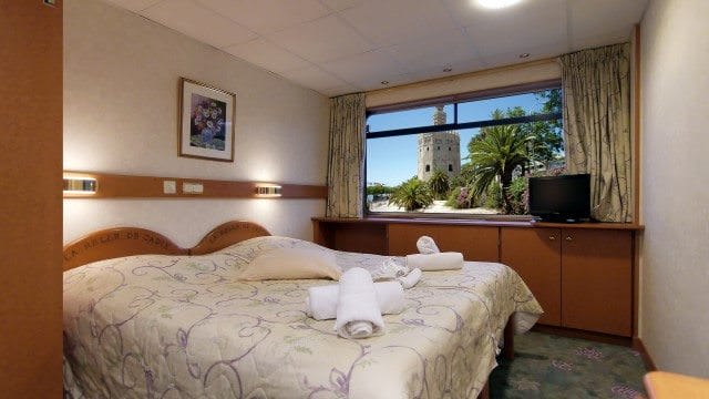 All staterooms aboard Belle de Cadix feature river views. Photo courtesy of CroisiEurope.