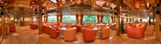 The attractive Lounge aboard L'Europe features comfortable seating and views of the passing scenery. Photo courtesy of CroisiEurope.