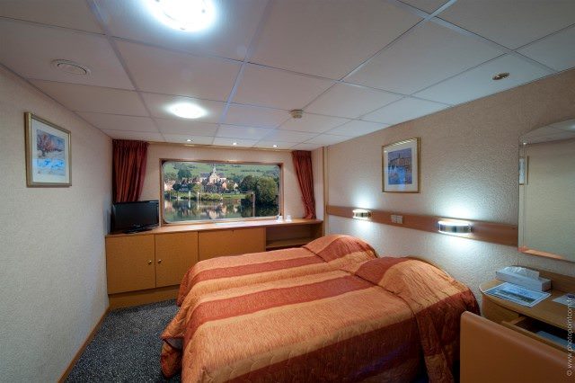 Staterooms aboard Seine Princess feature fixed-window views of the passing scenery. There are also two Suites onboard. Photo courtesy of CroisiEurope.