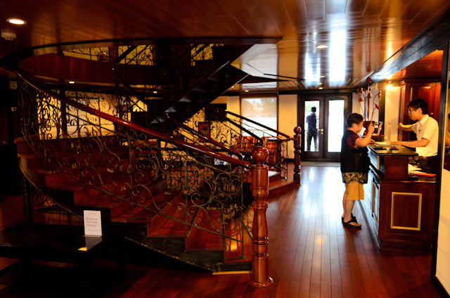 The central staircase aboard AmaLotus on Deck 1. The Reception Desk is to the right. Photo © 2013 Aaron Saunders