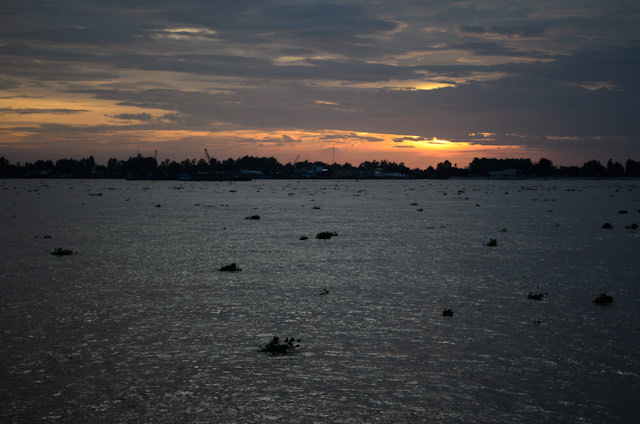 Our first sunset along the Mekong in Vietnam. Photo © 2013 Aaron Saunders