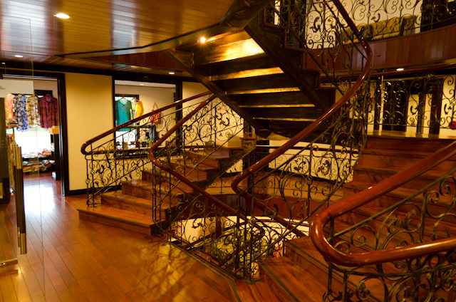 The Deck 2 central staircase landing aboard AmaLotus. Directly ahead is the ship's Gift Shop. Photo © 2013 Aaron Saunders