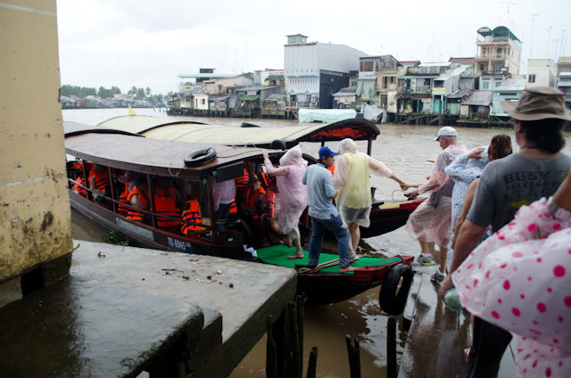 Re-boarding our boats for the scenic trip back to the mid-stream anchorage of the AmaLotus! Photo © 2013 Aaron Saunders