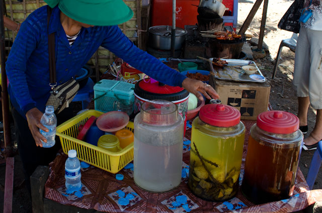 Brewing traditional Cambodian spirits. Photo © 2013 Aaron Saunders