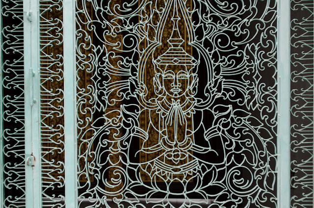 Elaborate steel gates at the Royal Palace in Phnom Penh. Photo © 2013 Aaron Saunders