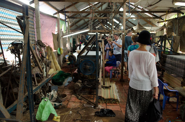 Inside the rattan mat-making factory. There are no computers or automation here. Photo © 2013 Aaron Saunders