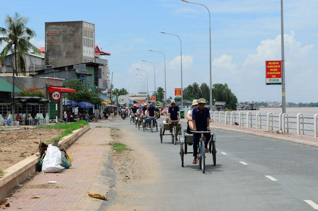 Racing back through the streets of Tan Chau by rickshaw to the waiting AmaLotus. Photo © 2013 Aaron Saunders