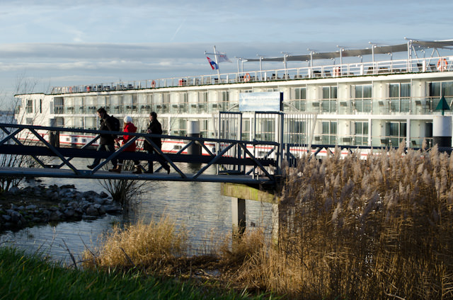 Guests disembark Viking Baldur for an afternoon of touring ashore in Kinderdijk, Netherlands. Photo © 2013 Aaron Saunders