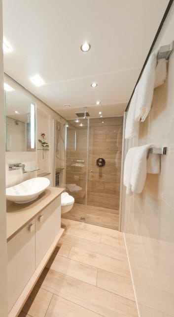The crisp, clean bathroom in one of Tauck's new Loft Staterooms aboard the ms Inspire. Photo courtesy of Tauck.