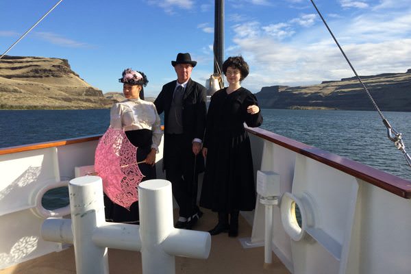 Guides in period costumes help guests understand the history of the places they'll sail to. Photo courtesy of Un-Cruise Adventures