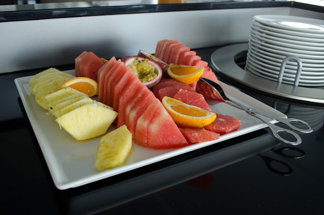 Enjoying a light breakfast in the Horizon Lounge. Fruits, yogurts and breads are available each morning here. Photo © 2014 Aaron Saunders