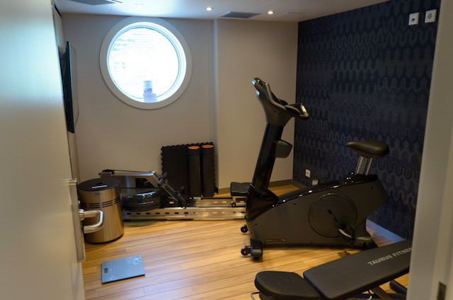 Taking the time to explore the Emerald Star: the small but functional Fitness Center on Deck 2 aft. Photo © 2014 Aaron Saunders