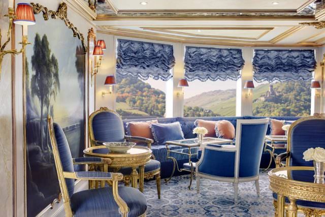 Relax in the ship's forward-facing lounge. Photo courtesy of Uniworld Boutique River Cruise Collection.