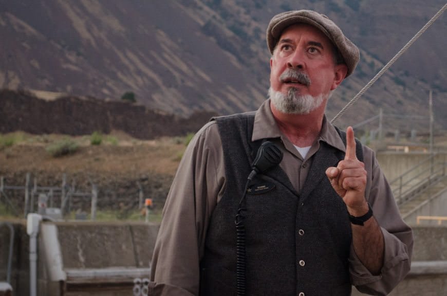 Our Historical Leader Kenne points out notable features of the landscape as we sail the Columbia River at sunset. Photo © 2015 Aaron Saunders