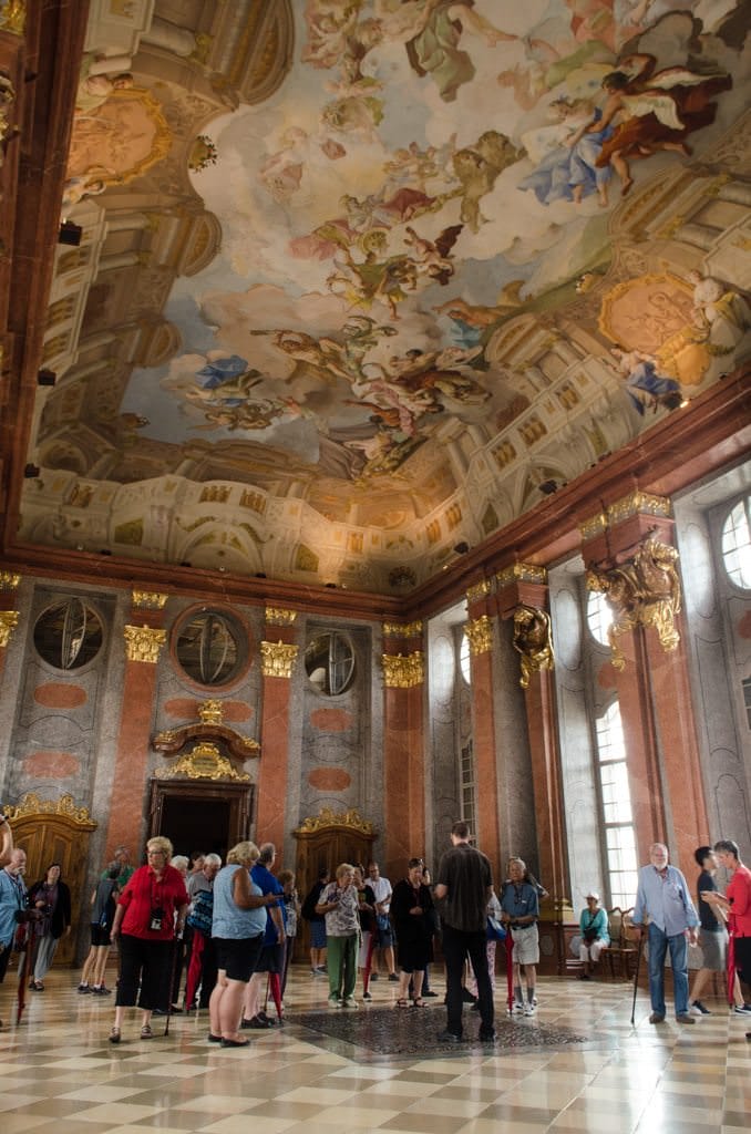 Melk Abbey's baroque opulence. The ceiling isn't really curved, though. Like so much of Melk Abbey, a trompe l'oeil, or illusion, has been employed. Photo © 2015 Aaron Saunders