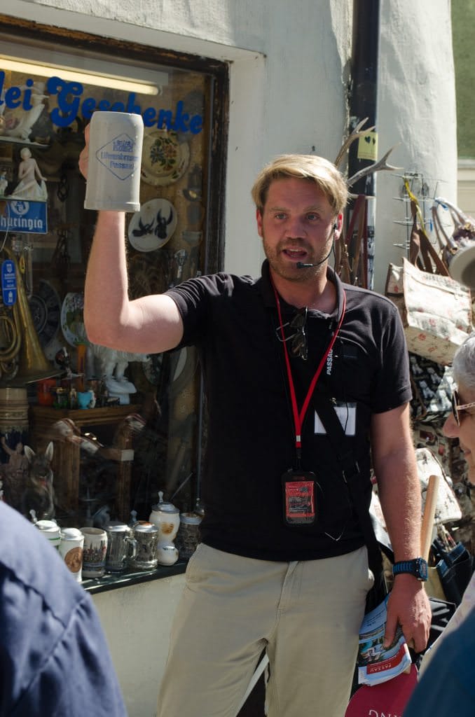 Now THIS is a Beer! Our guide demonstrates the proper size of a Bavarian beer. Photo © 2015 Aaron Saunders