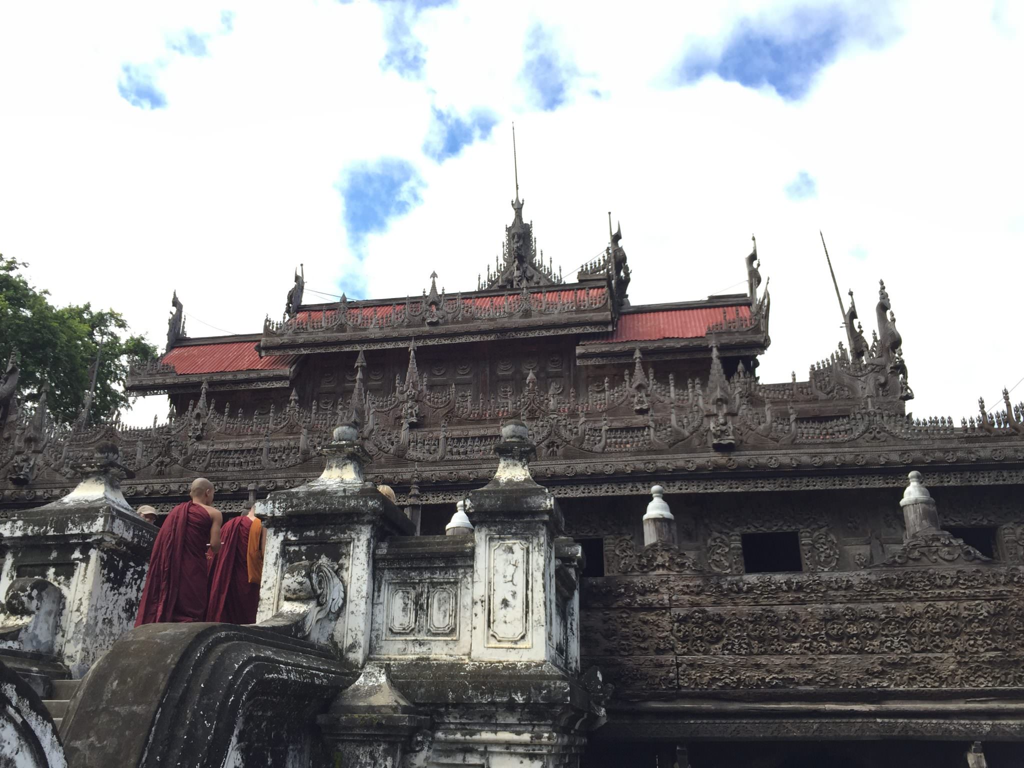 Moments after I took this photo, the monks spun around to put the Palace at their backs and took a selfie with their iPhones. I wish I would've caught that on film, as it were. © 2015 Gail Jessen