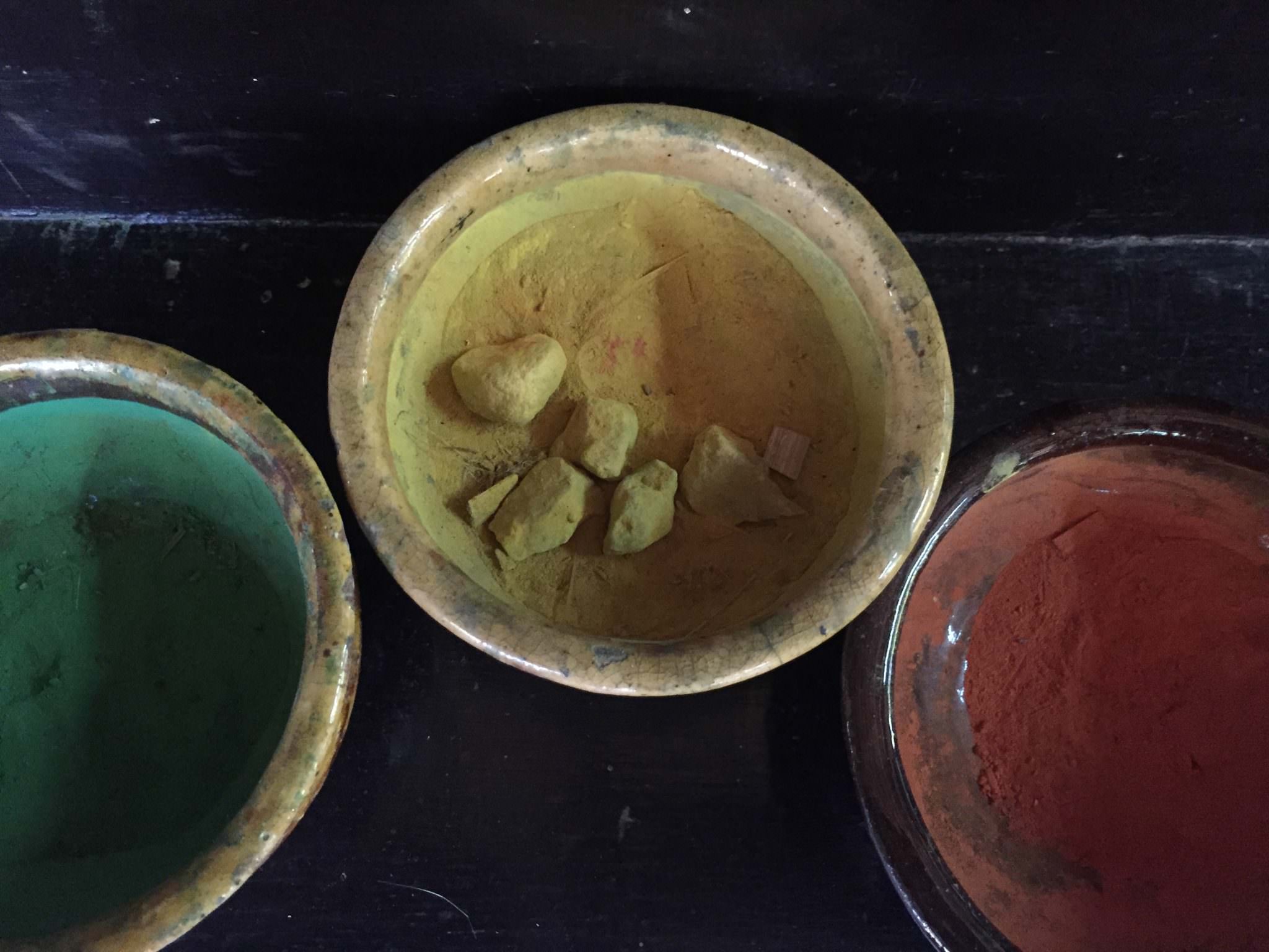 Different spices and ground plants + flowers are used to make the paint. © 2015 Gail Jessen