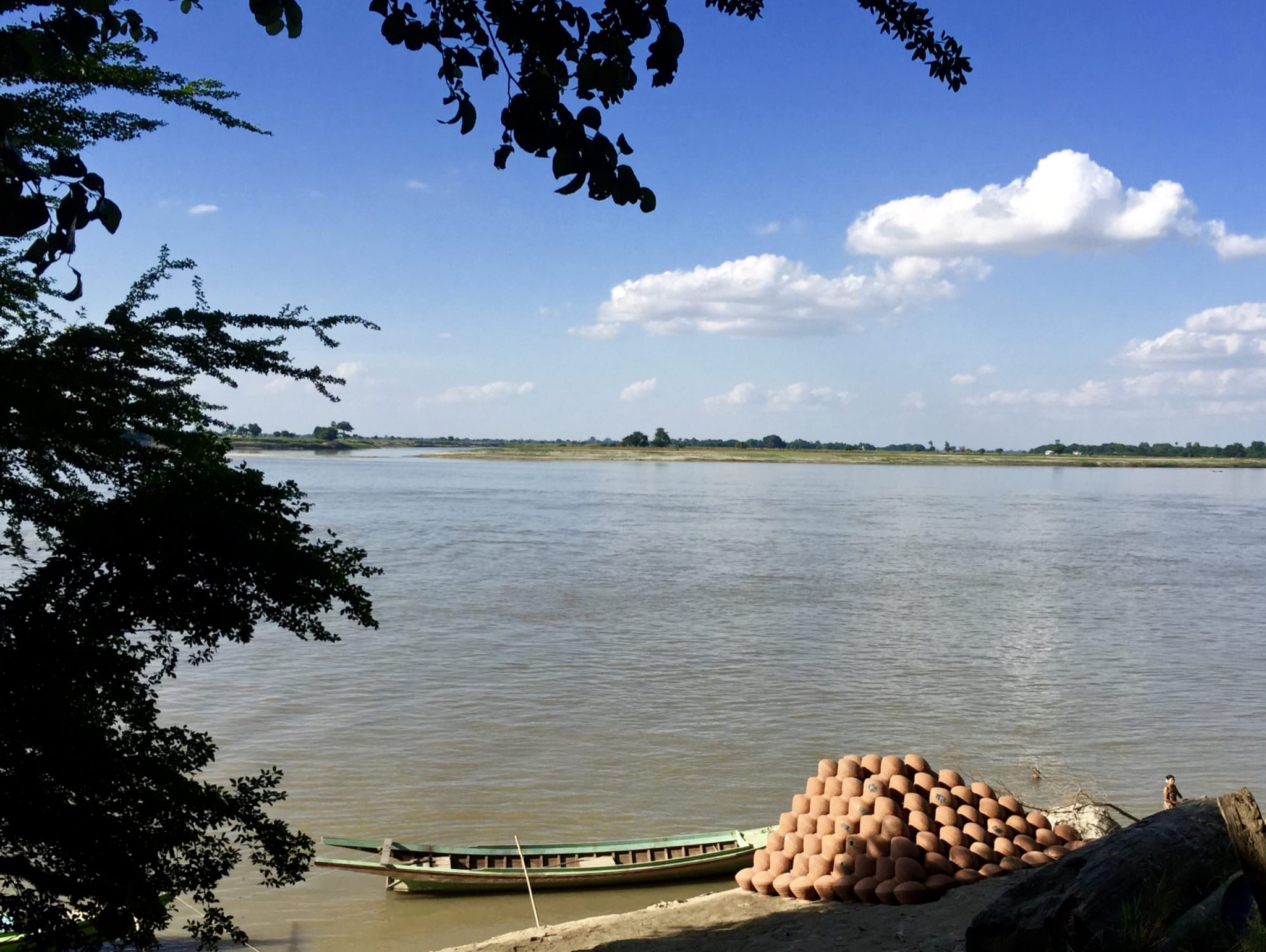On the bank of the Irrawaddy, completed pots are waiting for export. © 2015 Gail Jessen