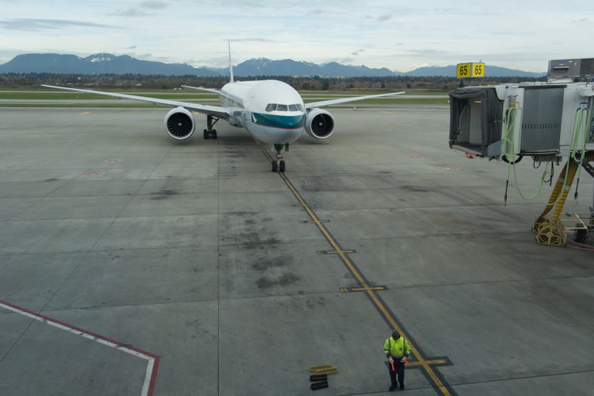 In Vancouver, my Cathay Pacific 777-300ER arrives to whisk me across the Pacific to Hong Kong. Photo © 2015 Aaron Saunders