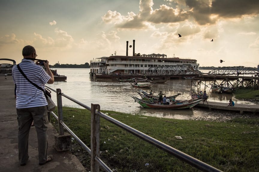 Before traveling to Shwedagon Pagoda, we stopped first for a panoramic vista of the riverfront in Yangon. Photo © 2015 Aaron Saunders