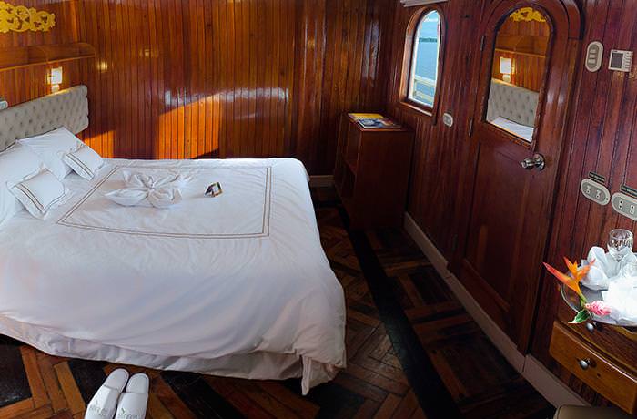 Staterooms aboard the Amatista feature gorgeous wood paneling and other Colonial touches. Photo courtesy G Adventures