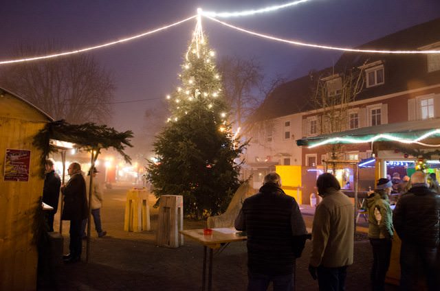 Christmas Markets - like this small one in Breisach, Germany - are known for their tradition and festive holiday atmosphere. Photo © 2013 Aaron Saunders