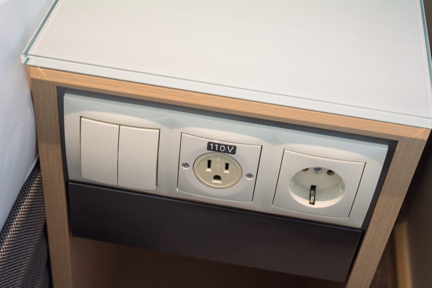 More handy touches: North American and European-style power outlets. I can't tell you how many times Viking has changed or re-positioned these on newer vessels as a result of guest feedback. Photo © 2016 Aaron Saunders